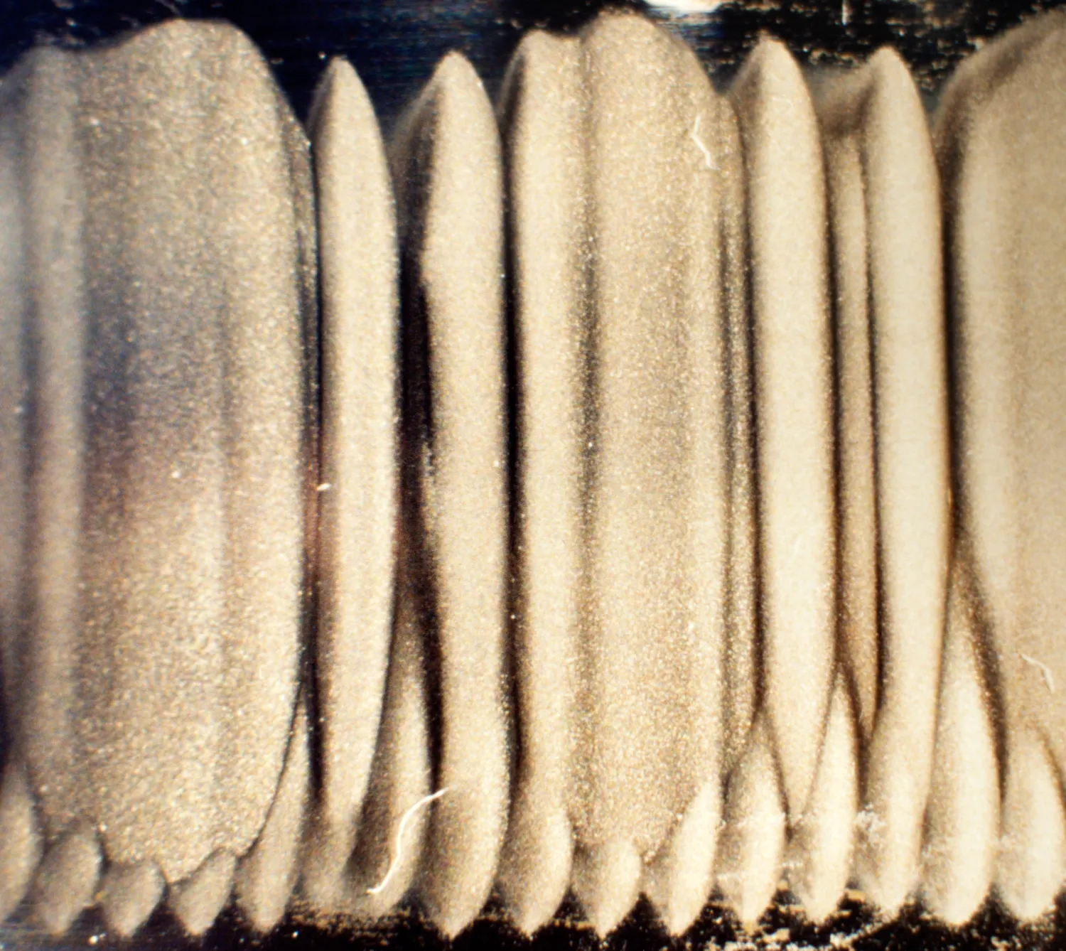Close-up of fluting marks on a bearing raceway