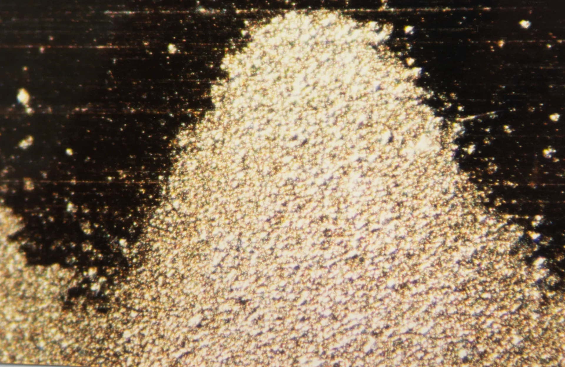 Close-up of electrical fluting damage on a bearing surface